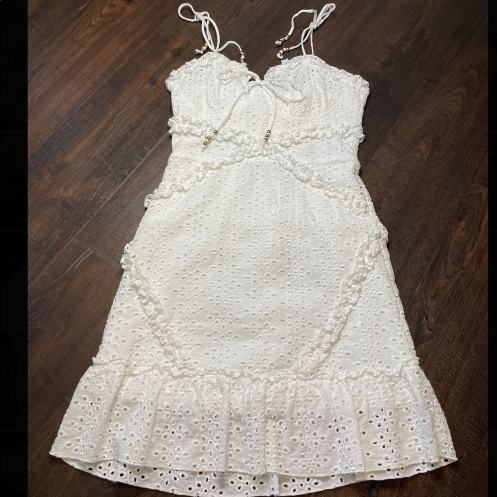 White shoulder tie mini dress
